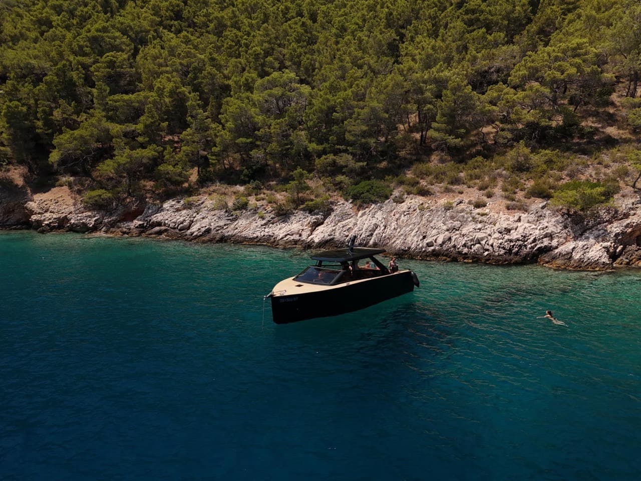 Colnago 35 bow-on at anchor in a hidden Adriatic bay
