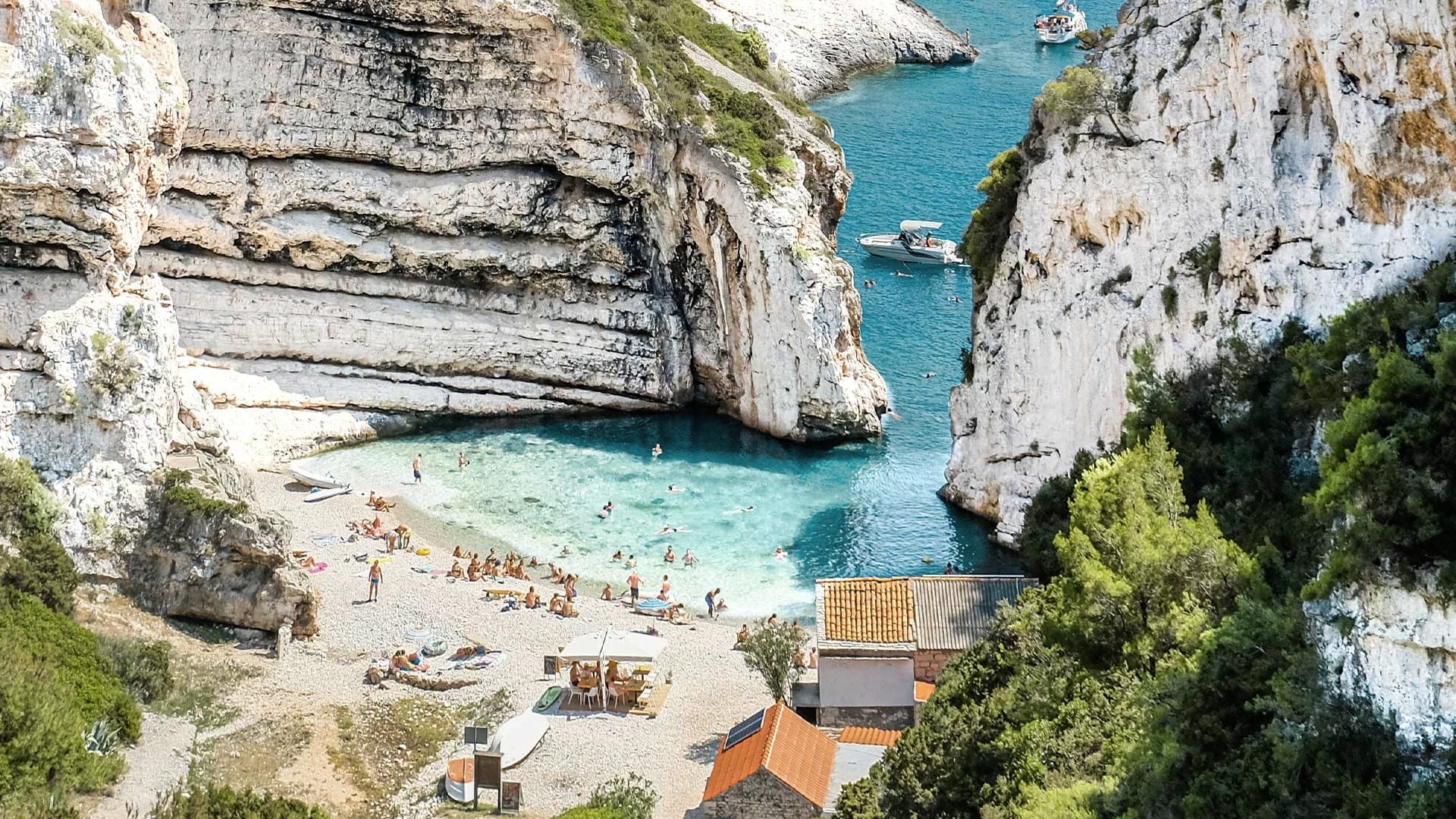 Clear water against pale rock at a sheltered cove near Split, the kind of spot used for snorkelling