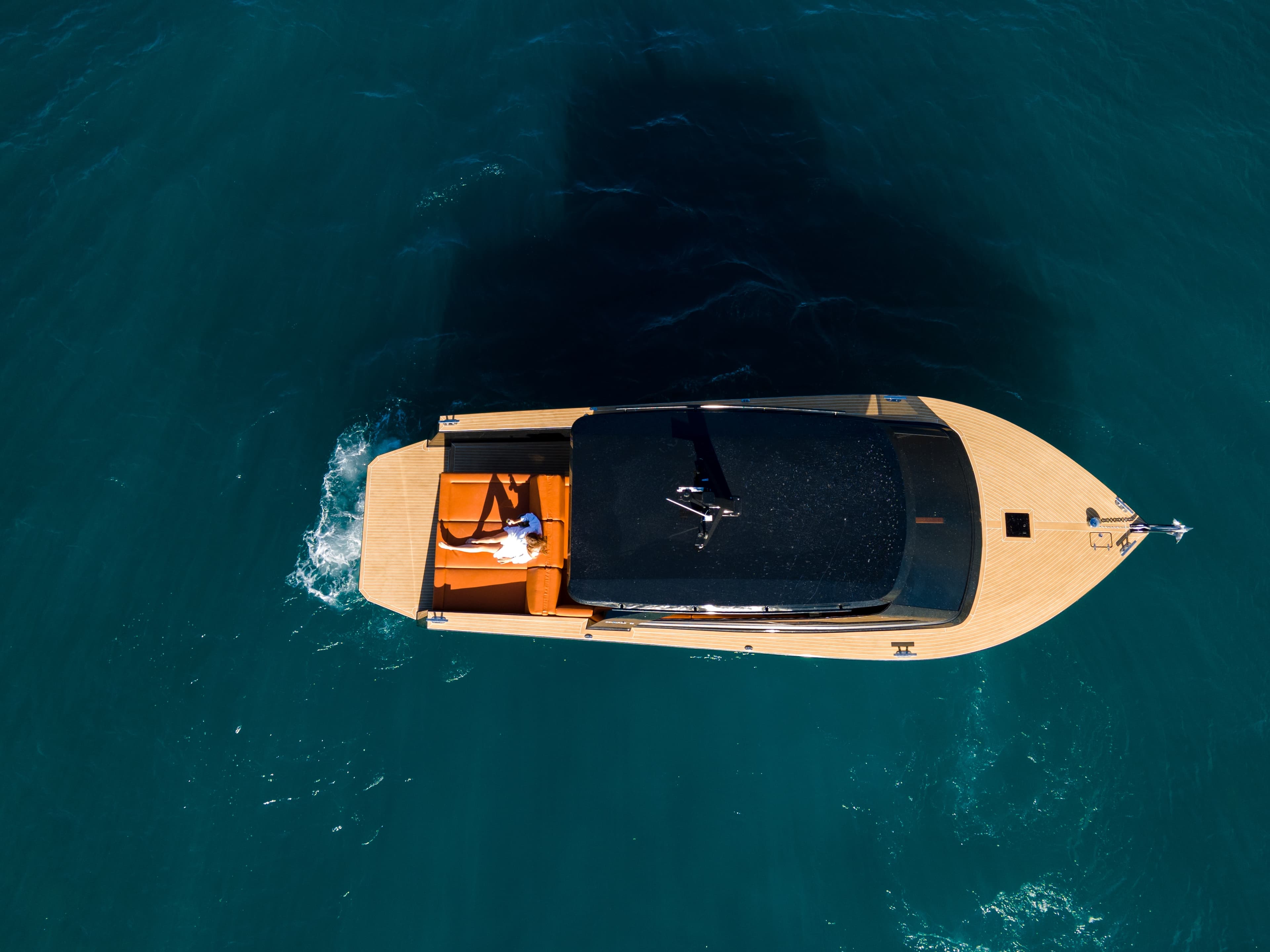 Aerial top-down view of the Colnago 35 on crystal-clear Adriatic water
