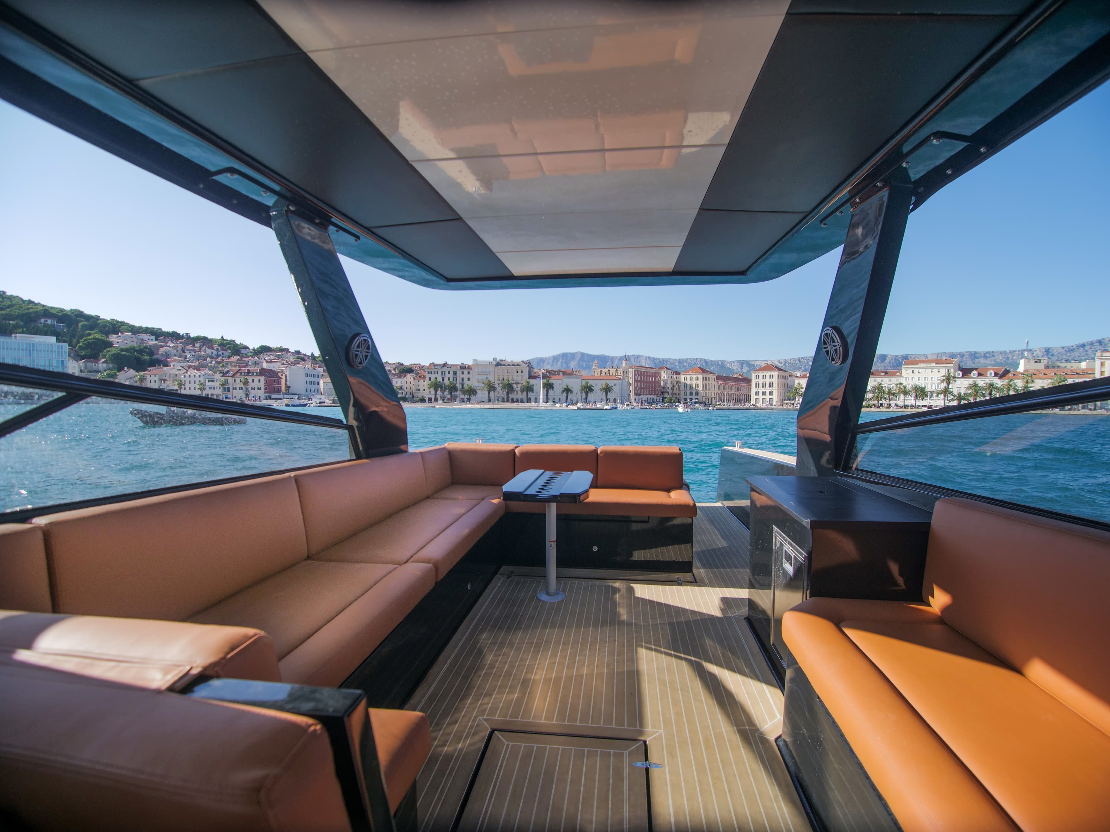 Colnago 35 cockpit with orange leather seating and Split waterfront behind