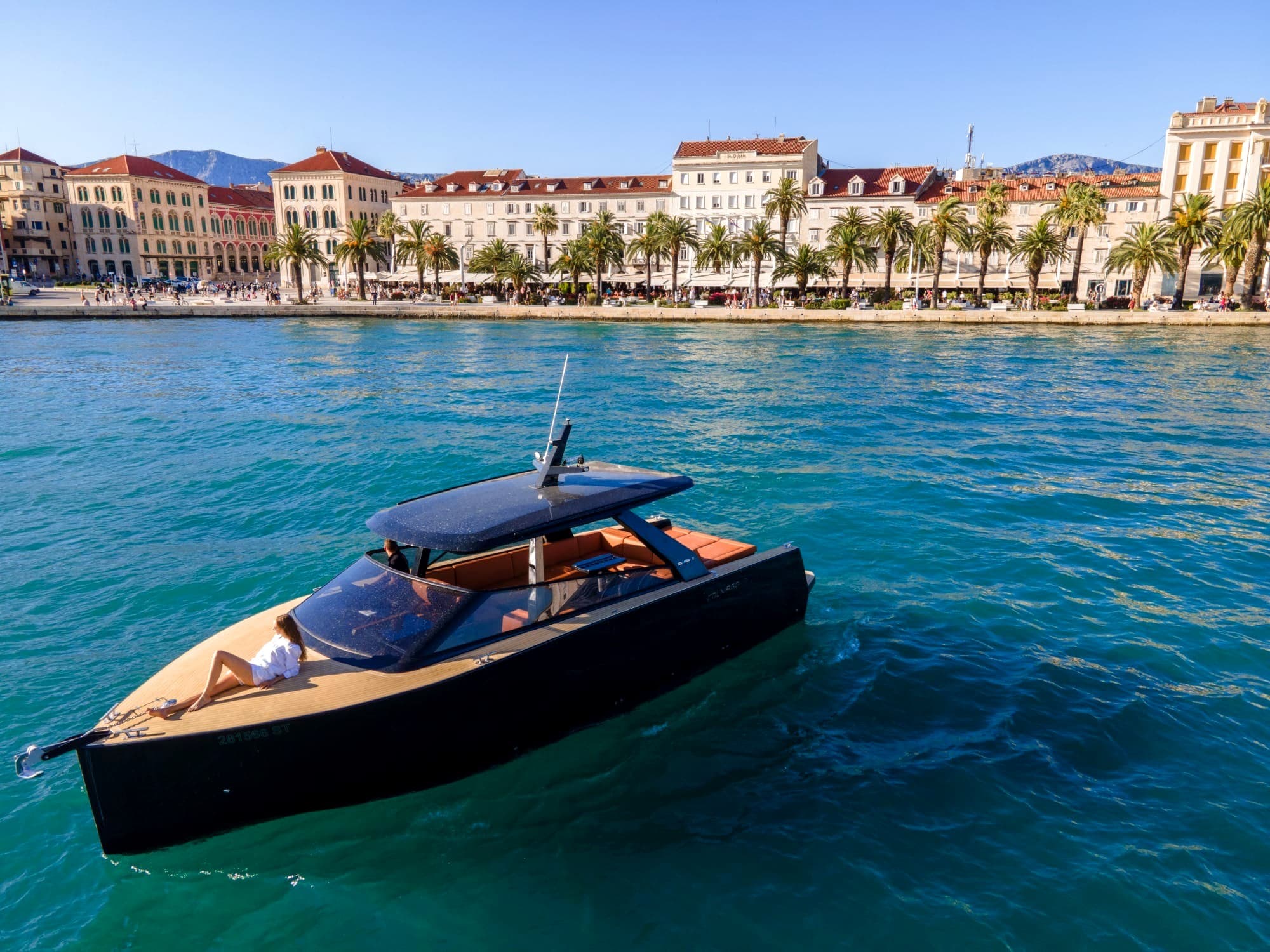 Sea Split's black Colnago 35 in front of the Split Riva, ready for a transfer