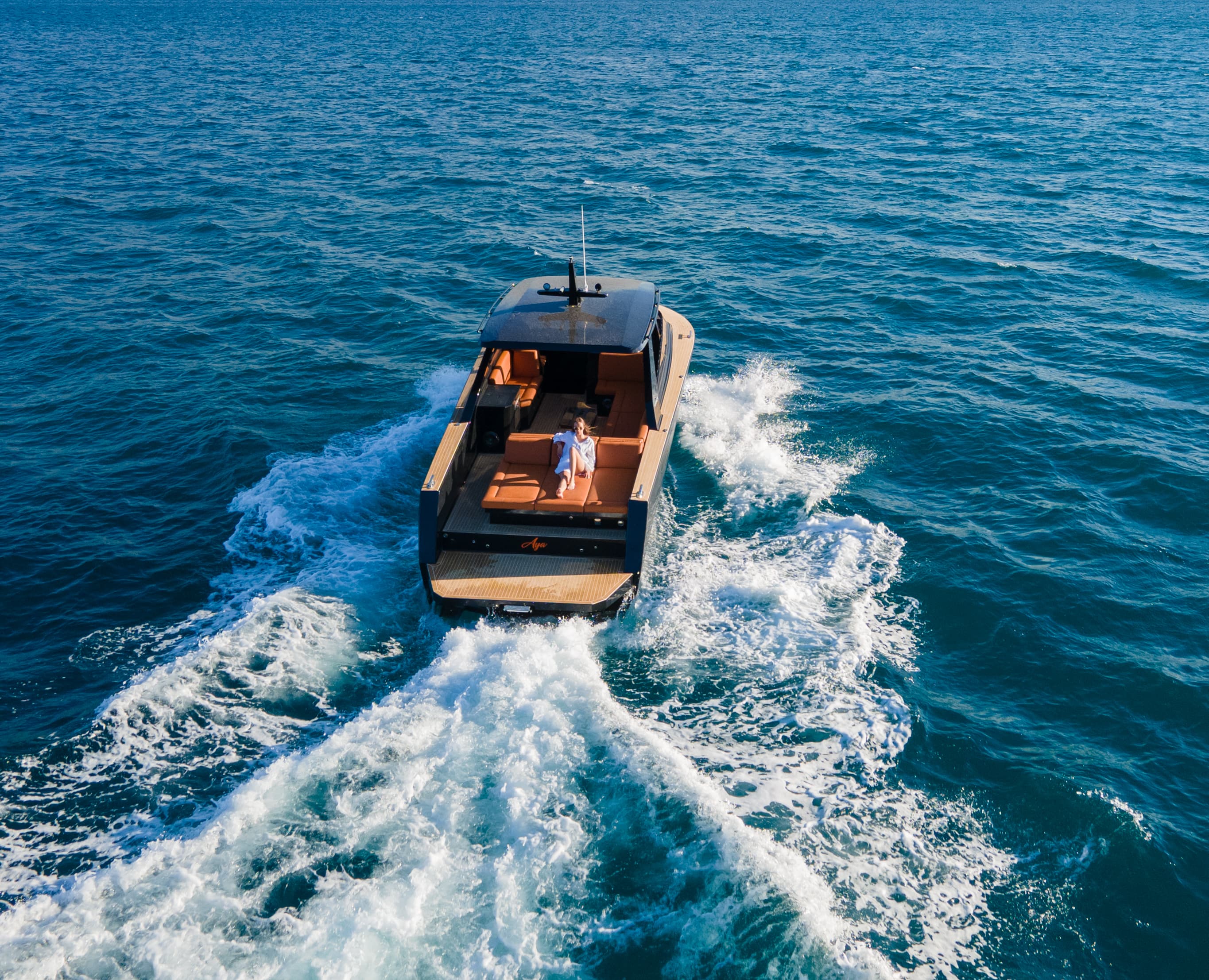 Aerial view of the Colnago 35 at speed leaving a white wake on the Adriatic