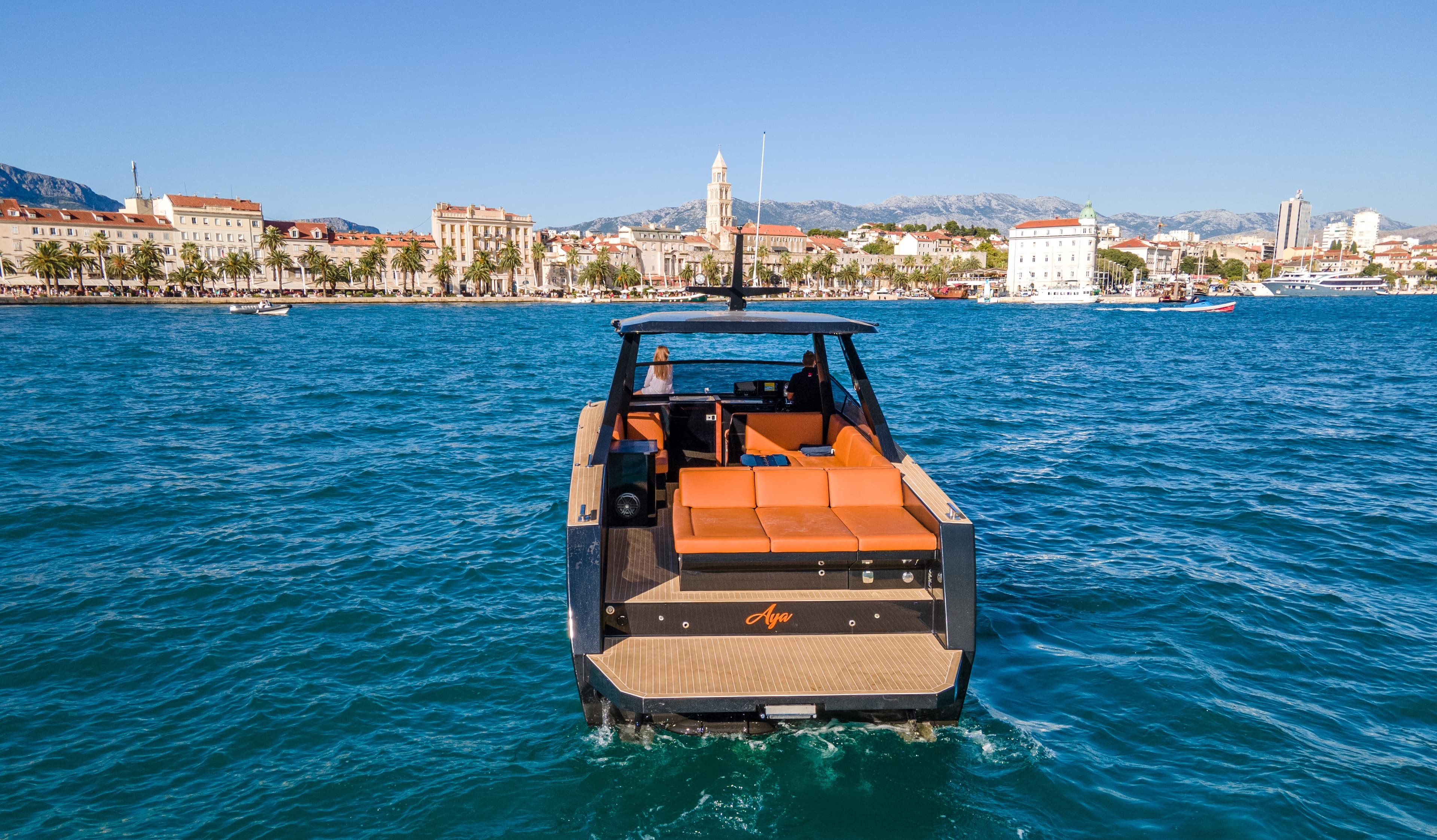 Colnago 35 in Split harbor with the city skyline and Diocletian's Palace behind